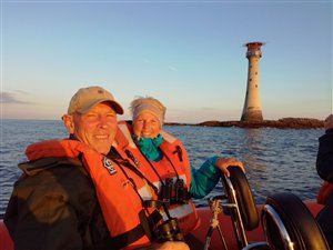 Steve and fellow volunteer (wife Jean) on last night boat trip
