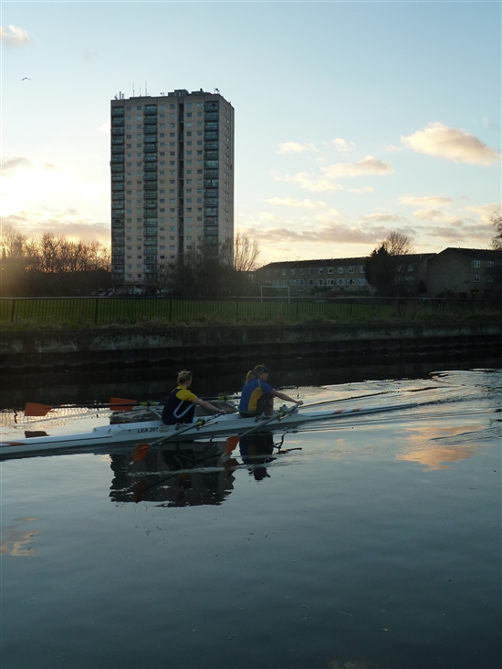 A pair of rowers on the glorious River Lee in Hackney at sunset.