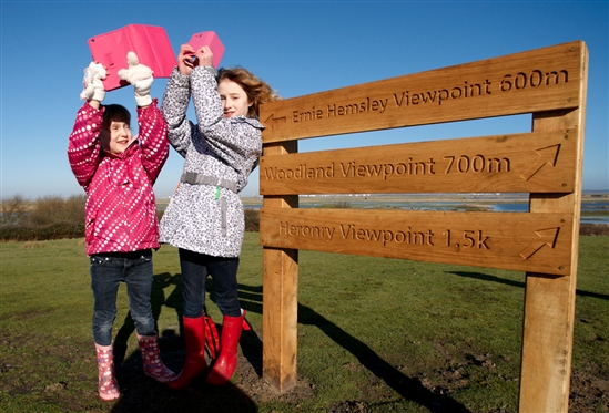 Evie and Annabel at RSPB Northward Hill enjoying the sunshine and taking photos to enter into the Young Photographer category – Good luck girls! Photo by Jodie Randall