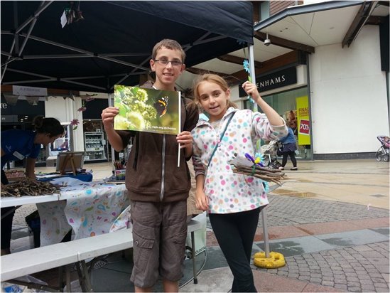 A brother and sister show off a big hotel they made with the Stef outside a shopping centre in Broadstairs