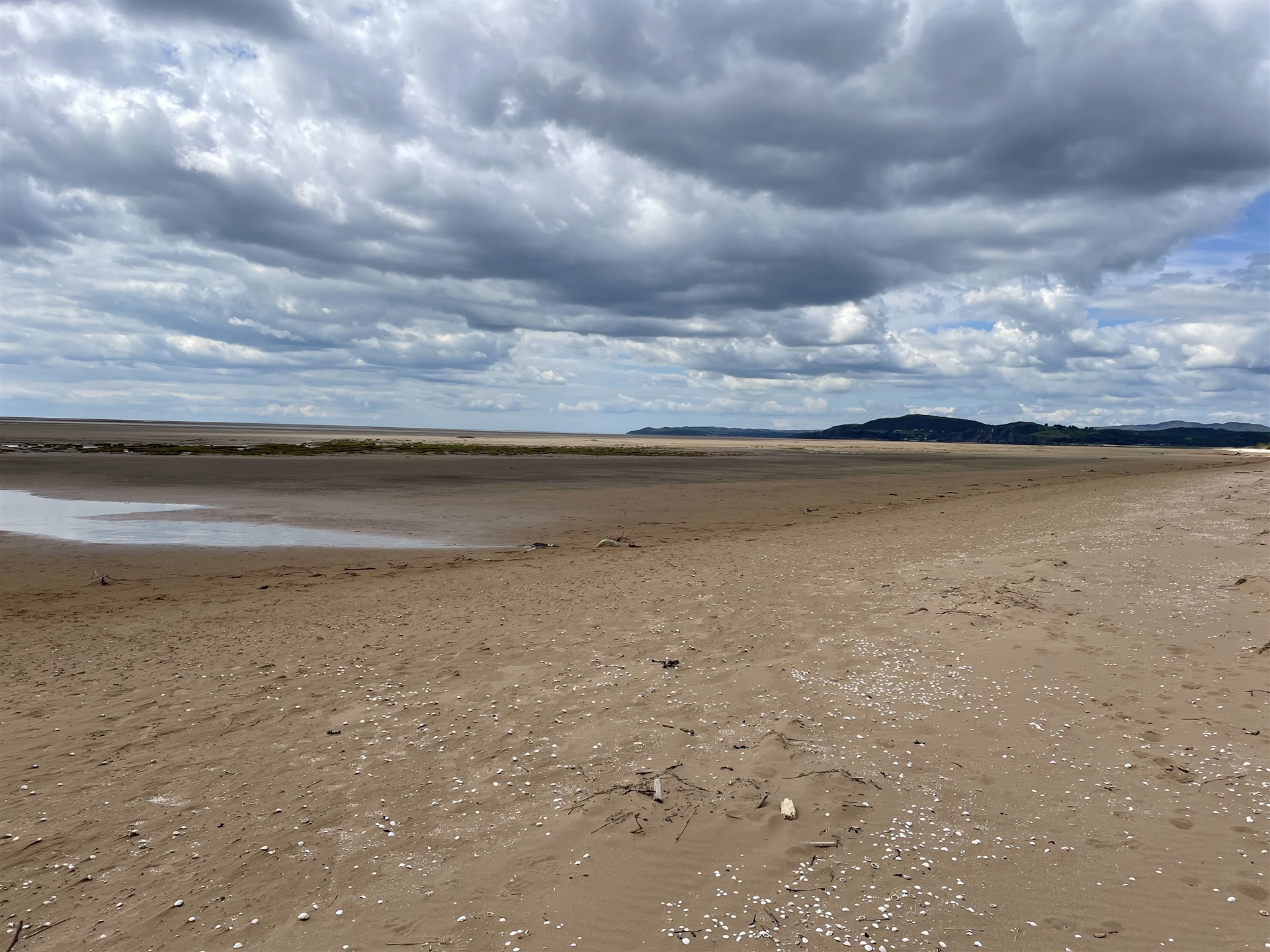 A panoramic view over the beach at Mersehead with the Solway Firth in the background.