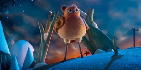 A needle felted robin stands in the snow. Robin Robin is the new film from Netflix and Aardman coming soon.