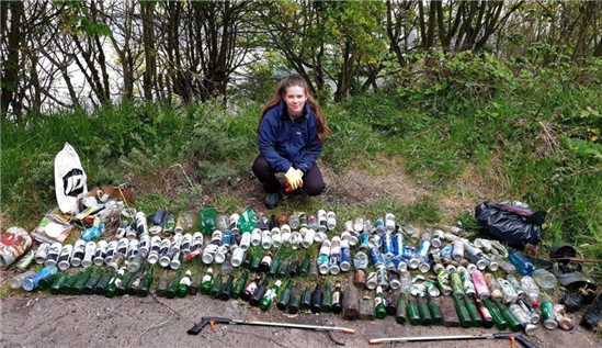 Niamh Byrne with litter collected from beach